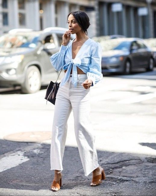 blue blouse and white pants